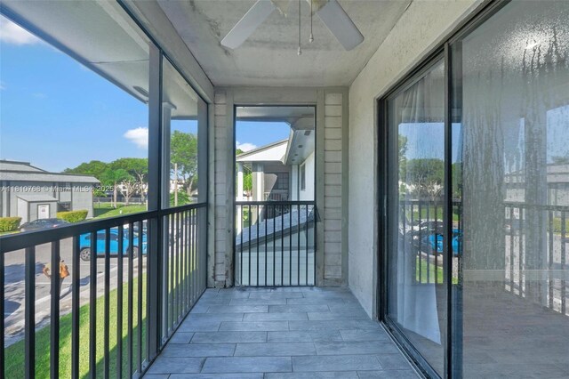 469 NE 207th Ln Unit 205, Miami, FL 33179 - balcony with a ceiling fan