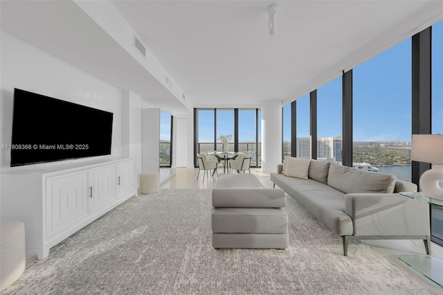 650 NE 32nd St Unit 3708, Miami, FL 33137 - living area with a wall of windows