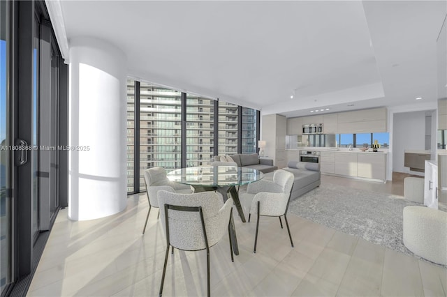 650 NE 32nd St Unit 3708, Miami, FL 33137 - dining area with healthy amount of natural light and expansive windows