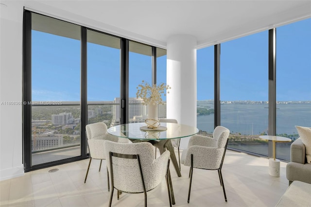 650 NE 32nd St Unit 3708, Miami, FL 33137 - sunroom / solarium featuring plenty of natural light and a water view