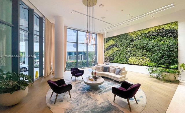 650 NE 32nd St Unit 3708, Miami, FL 33137 - building lobby with a wall of windows