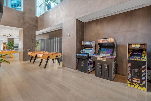650 NE 32nd St Unit 3708, Miami, FL 33137 - recreation room with wood finished floors and a towering ceiling