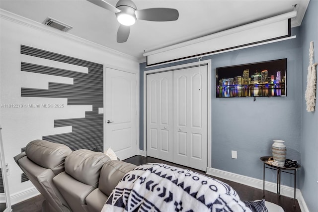 15760 SW 45th St, Miami, FL 33185 - bedroom featuring a closet, baseboards, crown molding, and dark wood-type flooring