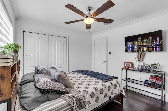 15760 SW 45th St, Miami, FL 33185 - bedroom featuring a closet, ornamental molding, wood finished floors, and ceiling fan
