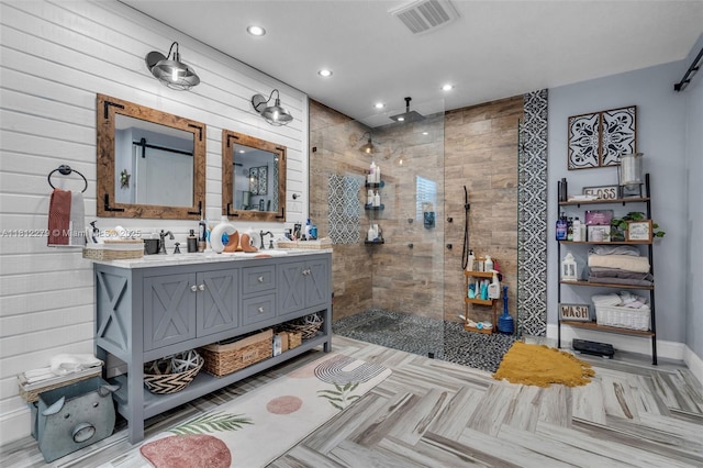 15760 SW 45th St, Miami, FL 33185 - bathroom featuring double vanity, a shower stall, recessed lighting, baseboards, and wooden walls