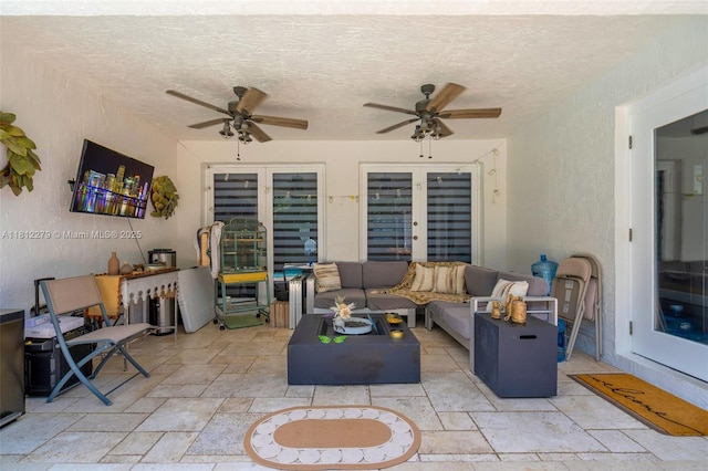 15760 SW 45th St, Miami, FL 33185 - living room with stone tile flooring, a ceiling fan, and a textured ceiling