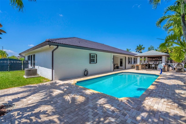 15760 SW 45th St, Miami, FL 33185 - view of swimming pool with a gazebo, a patio, and central AC