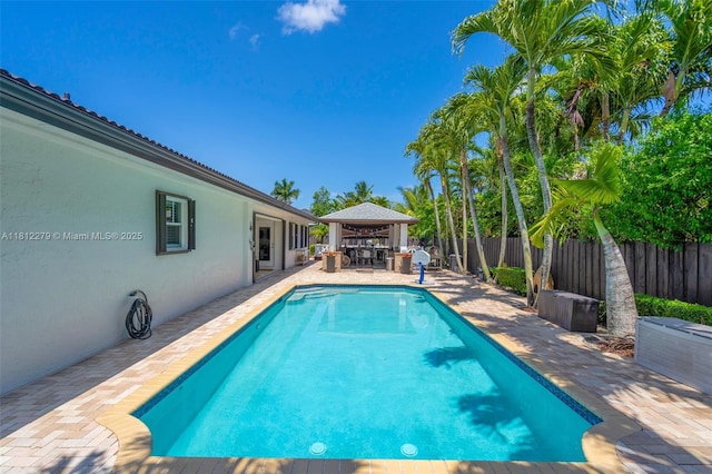 15760 SW 45th St, Miami, FL 33185 - view of pool featuring a gazebo, a patio, and a fenced backyard