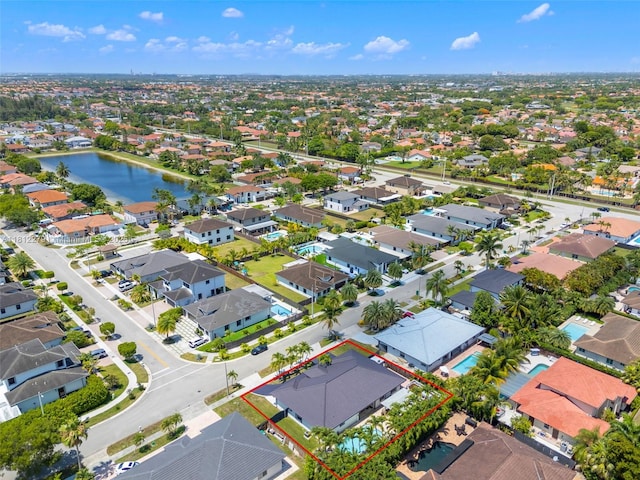 15760 SW 45th St, Miami, FL 33185 - aerial view of residential area with property parcel outlined and a large body of water