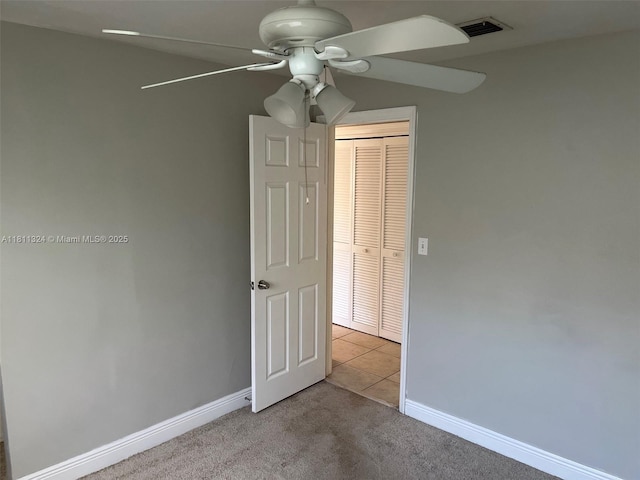3600 SW 2nd St, Fort Lauderdale, FL 33312 - carpeted empty room featuring a ceiling fan, baseboards, and tile patterned flooring