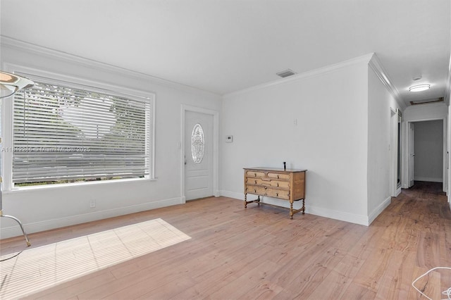 840 N 68th Ter, Hollywood, FL 33024 - foyer with ornamental molding, light wood-type flooring, and baseboards