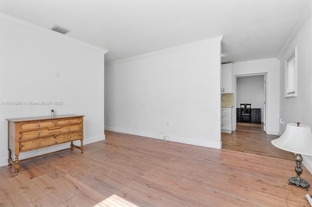840 N 68th Ter, Hollywood, FL 33024 - spare room with ornamental molding, light wood-style floors, and baseboards