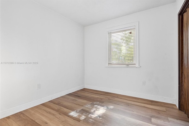 840 N 68th Ter, Hollywood, FL 33024 - empty room with baseboards and wood finished floors