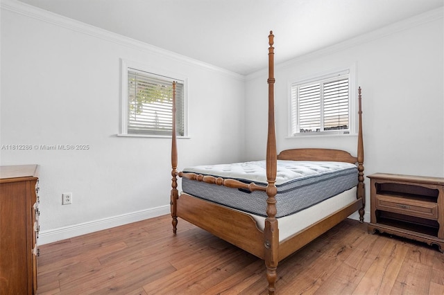 840 N 68th Ter, Hollywood, FL 33024 - bedroom with light wood-type flooring, ornamental molding, and baseboards