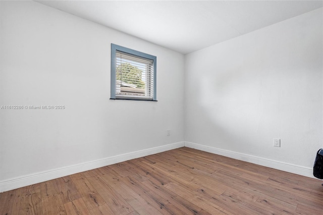 840 N 68th Ter, Hollywood, FL 33024 - spare room featuring baseboards and hardwood / wood-style flooring