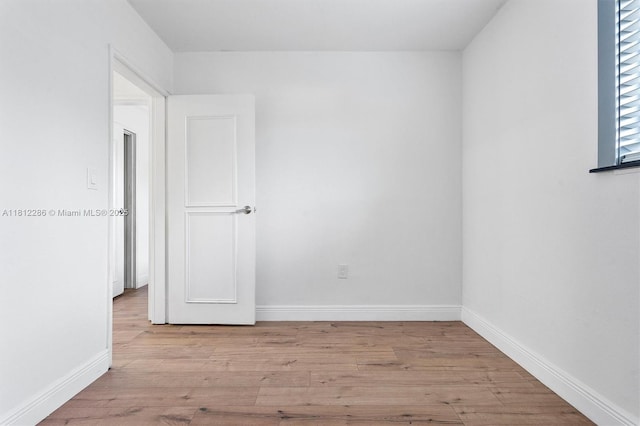 840 N 68th Ter, Hollywood, FL 33024 - unfurnished room featuring wood finished floors and baseboards