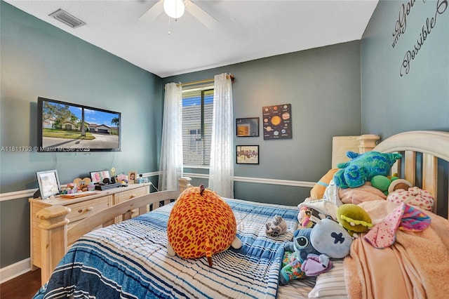 14520 SW 37th St, Miramar, FL 33027 - bedroom with baseboards, wood finished floors, and a ceiling fan