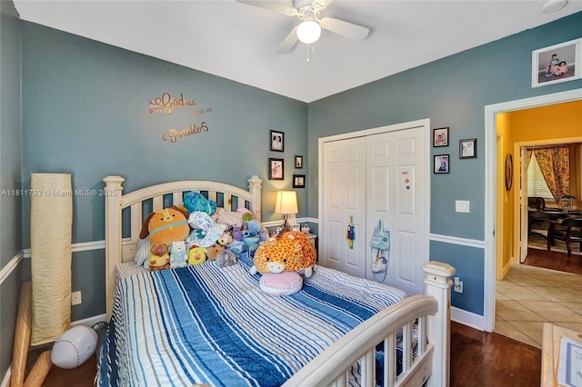 14520 SW 37th St, Miramar, FL 33027 - bedroom with a closet, wood finished floors, baseboards, and a ceiling fan