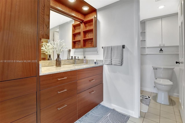 1709 Whitehall Dr Unit 401, Davie, FL 33324 - bathroom featuring tile patterned floors, vanity, toilet, baseboards, and recessed lighting