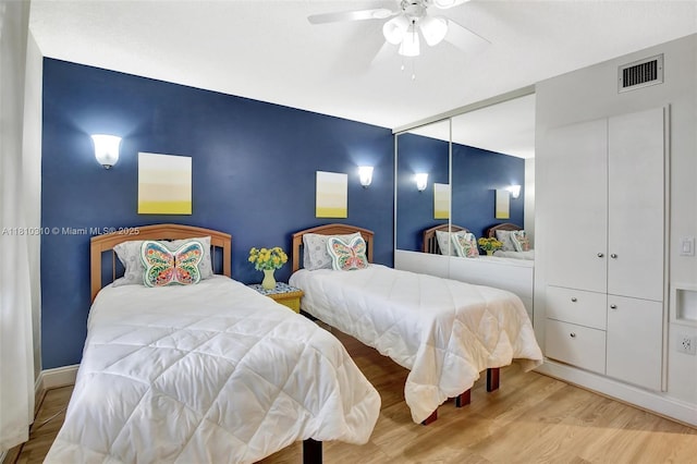 1709 Whitehall Dr Unit 401, Davie, FL 33324 - bedroom with wood finished floors and ceiling fan