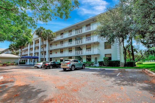 1709 Whitehall Dr Unit 401, Davie, FL 33324 - view of apartment building / complex with uncovered parking