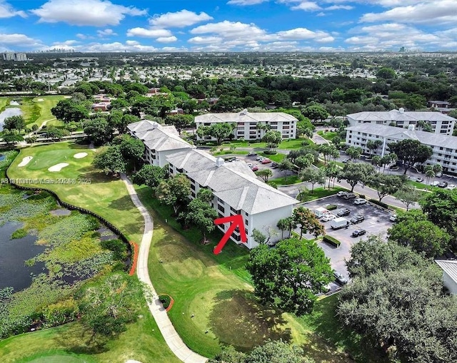 1709 Whitehall Dr Unit 401, Davie, FL 33324 - bird's eye view of a golf course, a nearby body of water, and apartment complex