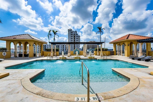 1607 Ponce De Leon Blvd Unit 12E, Coral Gables, FL 33134 - community pool with a patio, a pergola, and a gazebo