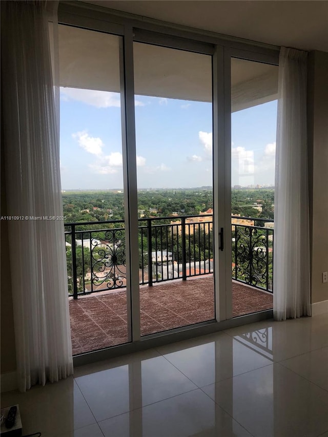 1607 Ponce De Leon Blvd Unit 12E, Coral Gables, FL 33134 - entryway with plenty of natural light and tile patterned floors