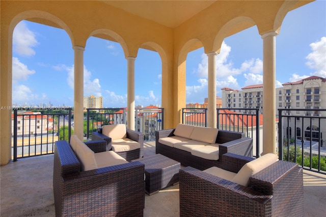 1607 Ponce De Leon Blvd Unit 12E, Coral Gables, FL 33134 - view of patio / terrace featuring a balcony, an outdoor living space, and a city view