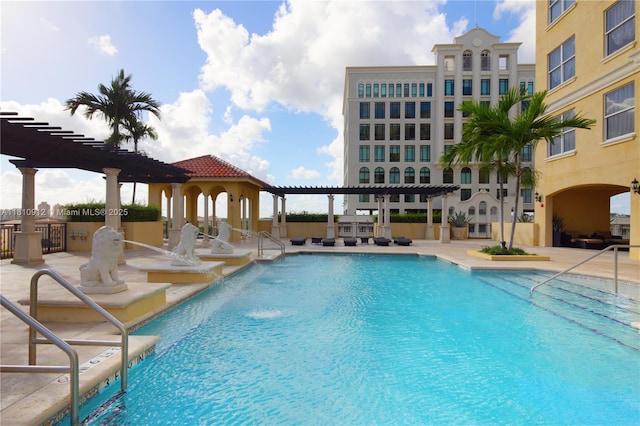 1607 Ponce De Leon Blvd Unit 12E, Coral Gables, FL 33134 - community pool featuring a patio and a pergola