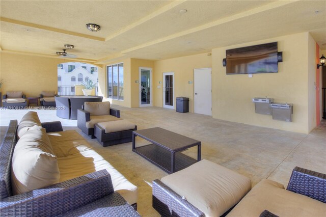 1607 Ponce De Leon Blvd Unit 12E, Coral Gables, FL 33134 - view of patio / terrace featuring an outdoor living space and ceiling fan