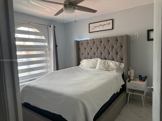 3297 W 70th St, Hialeah, FL 33018 - bedroom featuring marble finish floors and ceiling fan