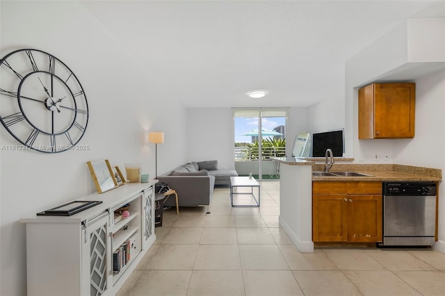 1723 SW 2nd Ave Unit 502, Miami, FL 33129 - kitchen with dishwasher, brown cabinets, open floor plan, and light tile patterned floors