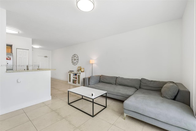 1723 SW 2nd Ave Unit 502, Miami, FL 33129 - living area with light tile patterned floors and baseboards
