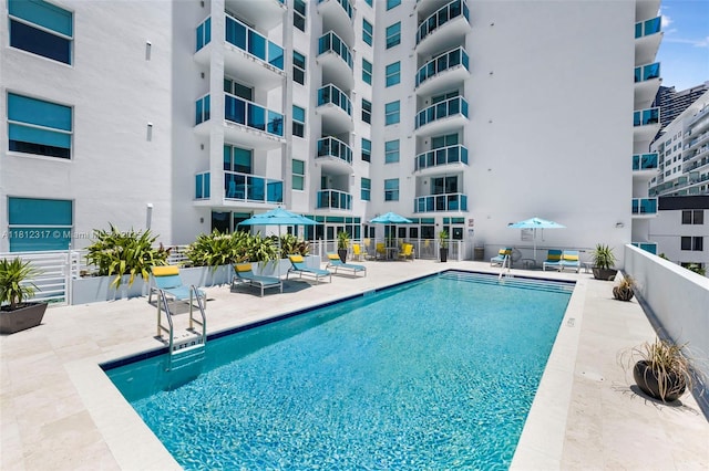 1723 SW 2nd Ave Unit 502, Miami, FL 33129 - community pool featuring a patio