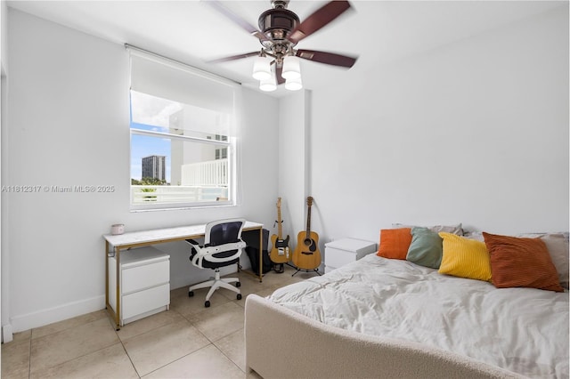 1723 SW 2nd Ave Unit 502, Miami, FL 33129 - bedroom with light tile patterned floors and ceiling fan