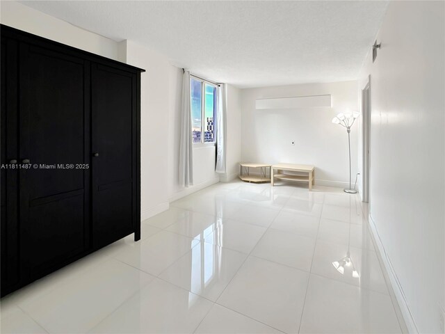 850 N Miami Ave Unit W-1903, Miami, FL 33136 - hall with baseboards and light tile patterned floors