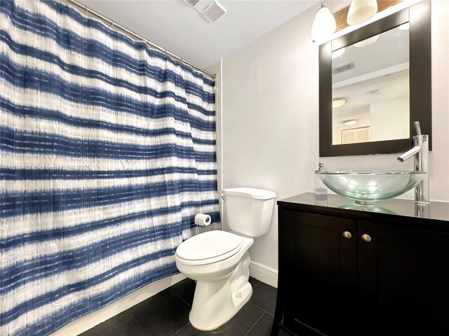850 N Miami Ave Unit W-1903, Miami, FL 33136 - full bath with vanity, toilet, tile patterned floors, and a shower with curtain