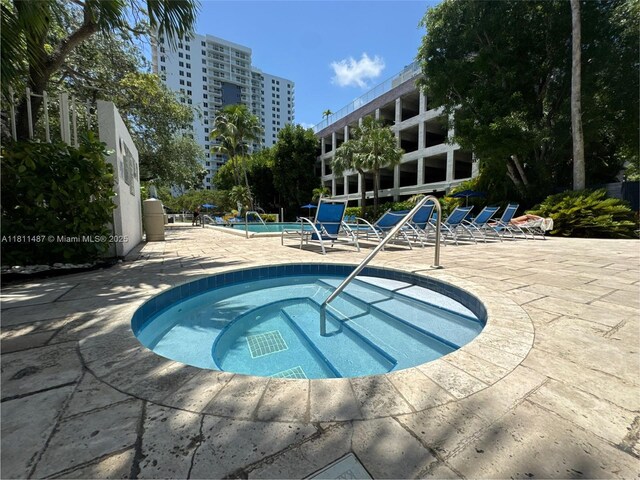 850 N Miami Ave Unit W-1903, Miami, FL 33136 - community pool featuring a community hot tub and a patio area