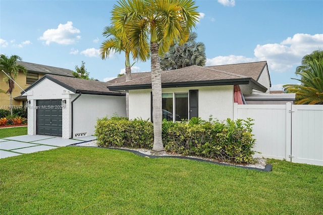 731 Briarwood Ter, Davie, FL 33325 - view of front of property with an attached garage, stucco siding, concrete driveway, and a shingled roof