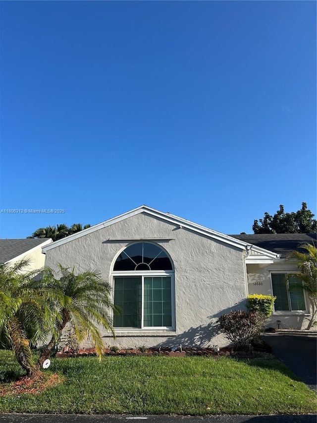 12680 SW 144th Ter, Miami, FL 33186 - view of side of property featuring stucco siding