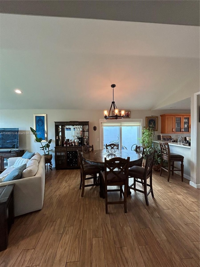 12680 SW 144th Ter, Miami, FL 33186 - dining room with wood finished floors, a chandelier, and recessed lighting