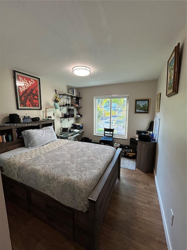 12680 SW 144th Ter, Miami, FL 33186 - bedroom with dark wood-type flooring and baseboards