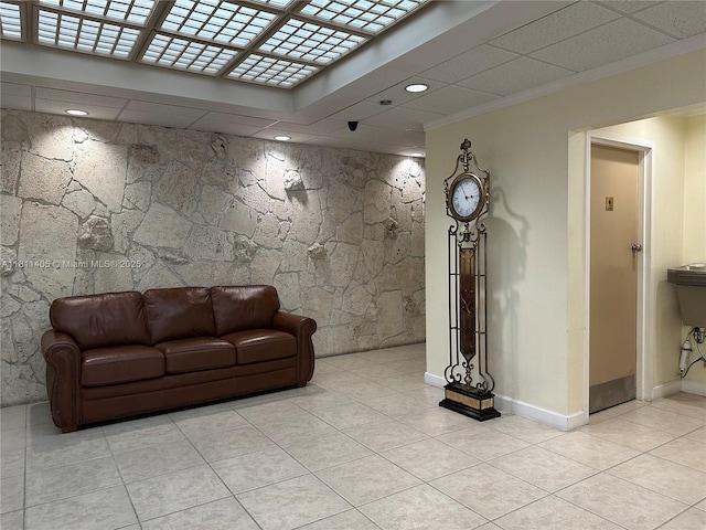 1100 NW Saint Charles Pl Unit 411, Pembroke Pines, FL 33026 - tiled living room with recessed lighting, baseboards, and crown molding