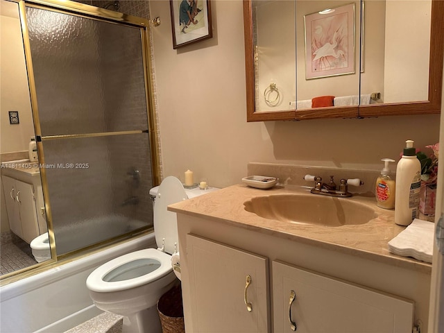 1100 NW Saint Charles Pl Unit 411, Pembroke Pines, FL 33026 - full bath featuring vanity, toilet, and bath / shower combo with glass door