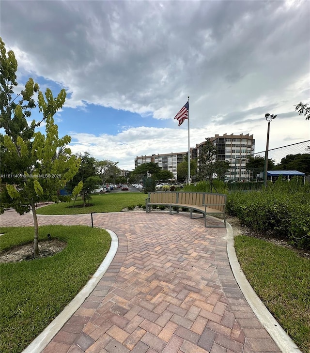 1100 NW Saint Charles Pl Unit 411, Pembroke Pines, FL 33026 - view of property's community featuring a lawn