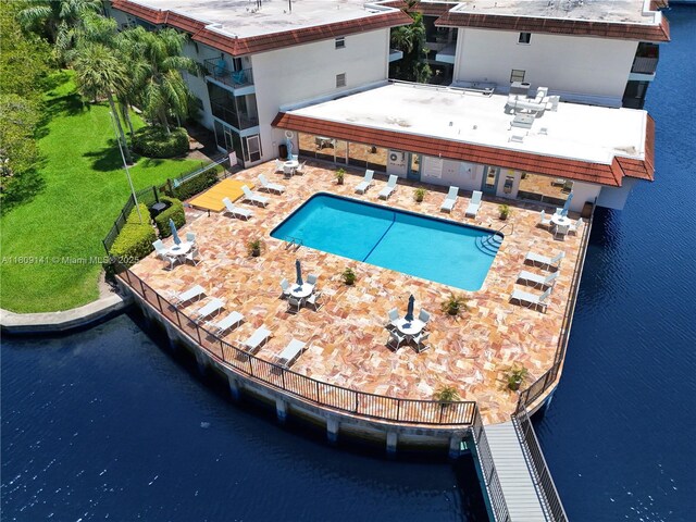 1775 N Andrews Sq Unit 104W, Fort Lauderdale, FL 33311 - community pool featuring a patio and a water view
