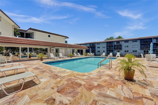 1775 N Andrews Sq Unit 104W, Fort Lauderdale, FL 33311 - community pool featuring a patio area