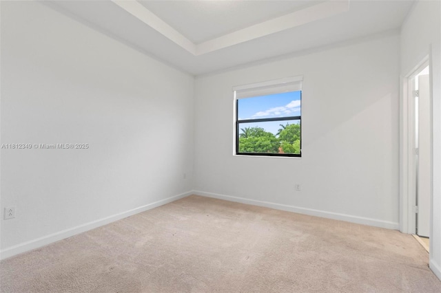 28569 SW 132nd Ct, Homestead, FL 33033 - carpeted spare room with baseboards and a raised ceiling