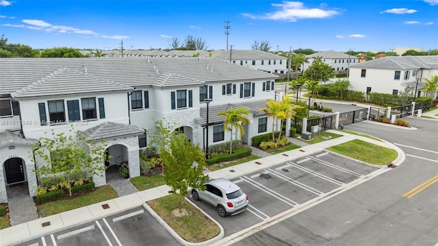 28569 SW 132nd Ct, Homestead, FL 33033 - view of building exterior with uncovered parking and a residential view